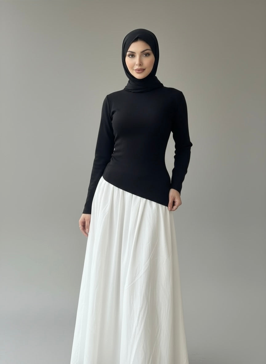 Pull noir assymétrique en maille fine